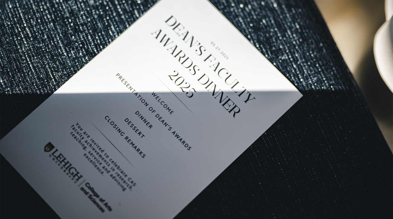 A dinner program at the CAS faculty awards dinner